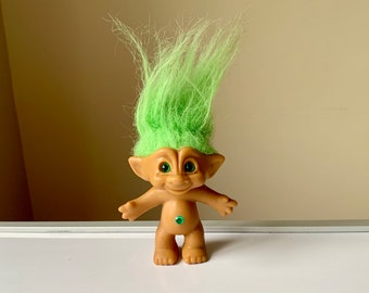 troll dolls with jeweled belly buttons