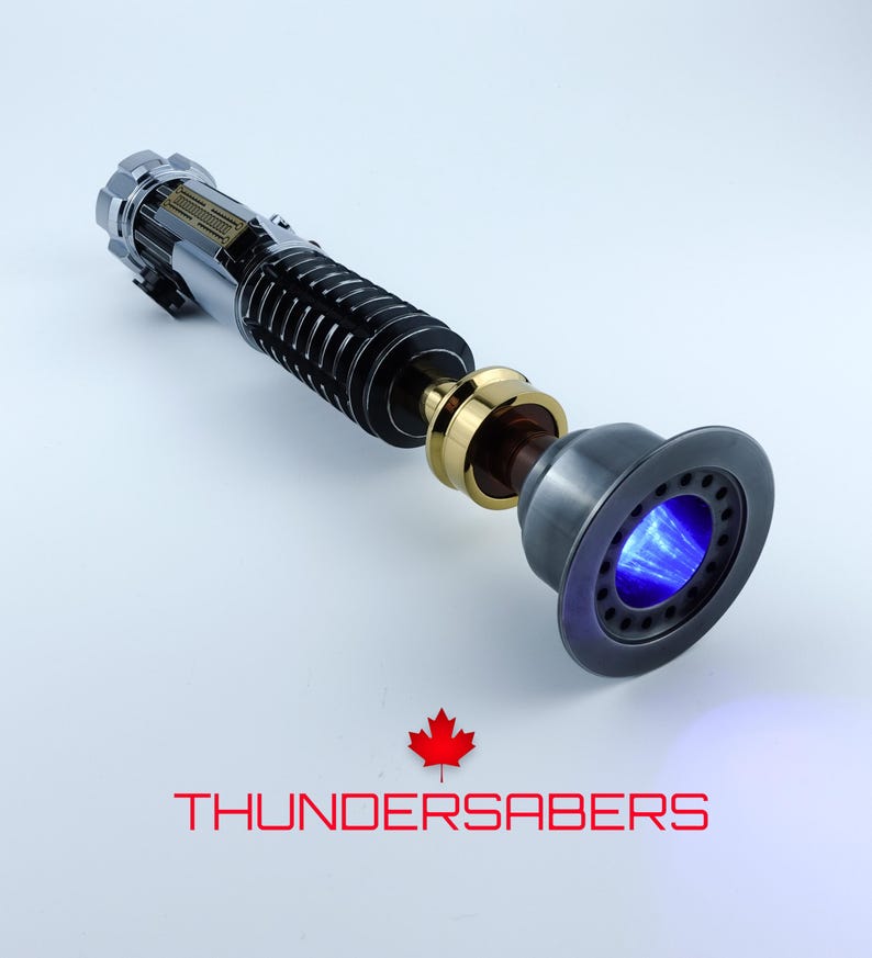 May include: A detailed lightsaber prop with a silver, black, and gold handle. The emitter glows with a bright blue light. The text "THUNDERSABERS" is displayed in red below the prop, along with a red maple leaf.