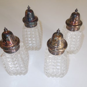 Four (4) Crystal Salt and Pepper Shakers with Silver Caps