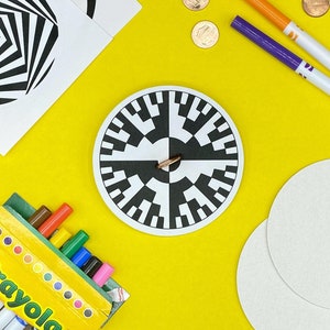 DIY Penny Spinner Craft Kit | STEAM Project for Kids | Mesmerizing Optical Illusions | Color-In with Crayola Markers | Classic Science Fun