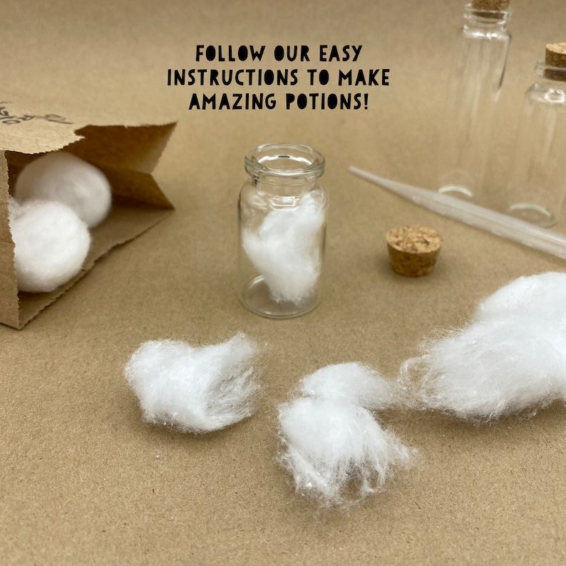 May include: A clear glass potion bottle with white cotton inside, alongside a cork, pipette, and additional bottles. A brown paper bag holds more cotton balls. The text reads: "FOLLOW OUR EASY INSTRUCTIONS TO MAKE AMAZING POTIONS!"