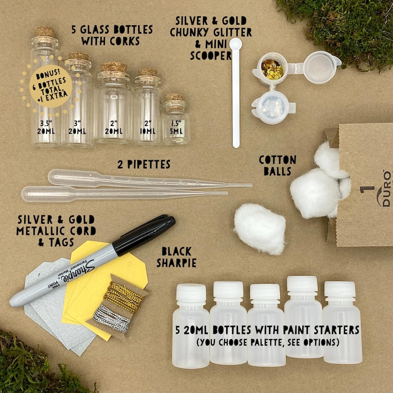 May include: A craft kit with glass bottles, corks, pipettes, glitter, cotton balls, metallic cord, tags, and a black Sharpie. Includes five 20ml bottles with paint starters. The kit also includes a bonus extra bottle.
