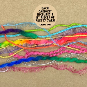 May include: A close-up of a pile of colorful yarn scraps. Each card/kit includes 8 pieces of 10-inch pretty yarn. *Colors vary*