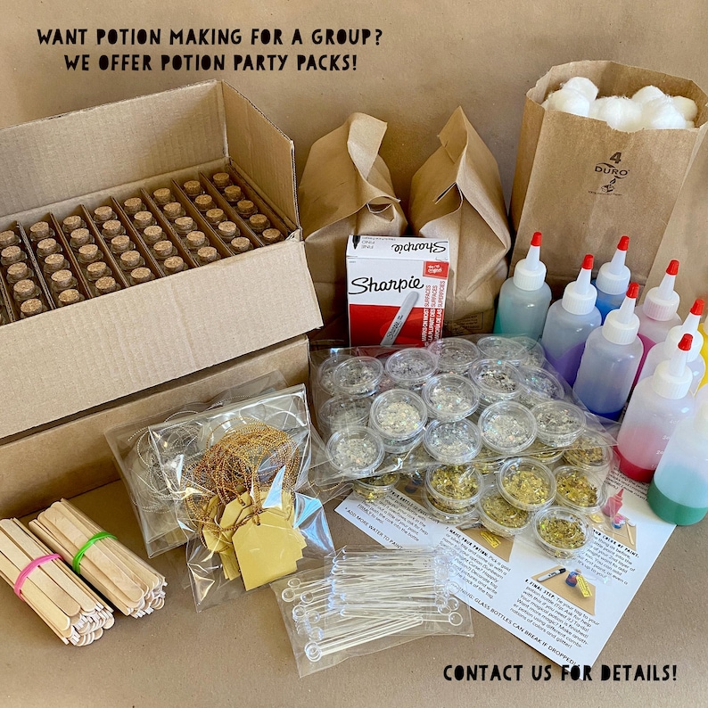May include: A collection of potion-making supplies, including small glass bottles, glitter, stir sticks, and a box of vials. The image also shows a box of Sharpie markers, paper bags, and a sign that says "WANT POTION MAKING FOR A GROUP? WE OFFER POTION PARTY PACKS! CONTACT US FOR DETAILS!"