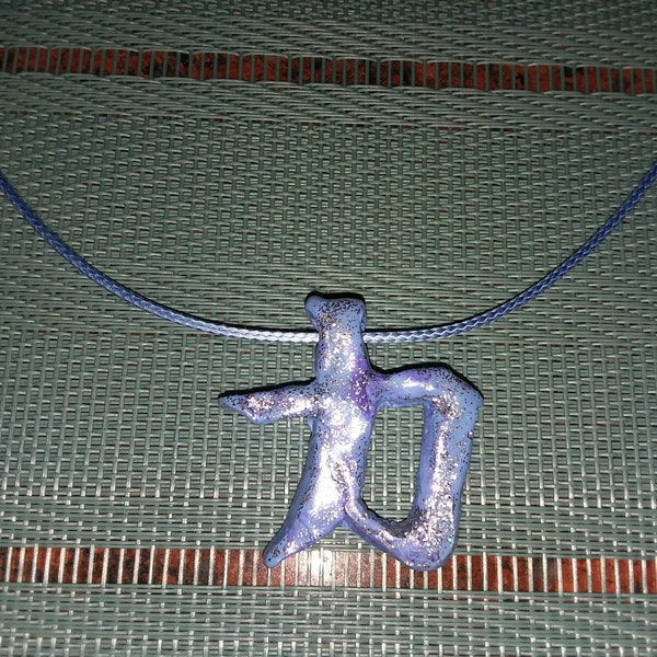 A Handmade Glittery Clay Kanji Symbol - for Strength - Pendant in Light Blue on a Matching Cotton Cord Necklace!  Colorful & Meaningful.