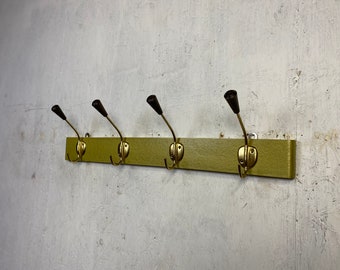 Iconic vintage hook rack with cracked paint