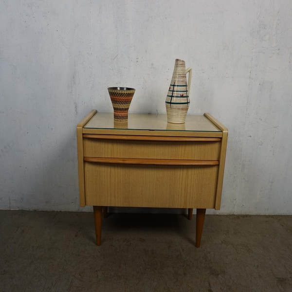 Delightful little nightstand in the typical mid-century look