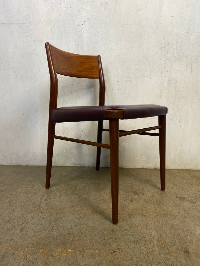 Un total de 8 chaises en teck conçues par Georg Leowald image 4