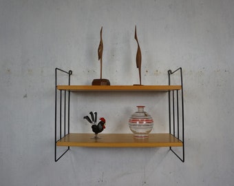 Original shelving system from WHB with two bright floors