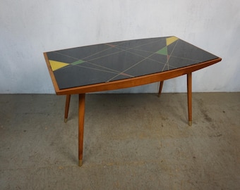 Great mid-century coffee table with Atomic glass top