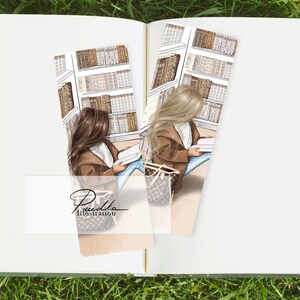 May include: Two illustrated bookmarks featuring women reading in a library setting. The women are wearing brown jackets and blue jeans. One has brown hair, the other blonde. The bookmarks have a white background with a logo.