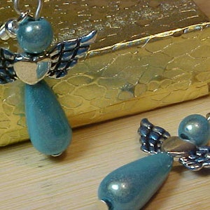 B-L/B Nice Pair Of Light BLUE ANGEL Dangle EARRINGS. With Gold Gift Box Included. Add To Your Jewelry  Or  As A Gift To Give Someone Special