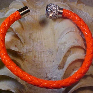 Y-319   Bright ORANGE Braided Color Leather BRACELET Stunning Rhinestone Magnetic Clasp Style BRACELET. Easy To Put On :)
