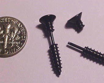 May include: Three black screw-shaped earrings. Two earrings have a screw-shaped post with a black top. The third earring has a screw-shaped post with a black top and a black screw-shaped bottom.