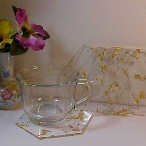 Hello : )  SET Of 4  Elegant CUP COASTERS with 24 Karat Gold Flakes, Emerged Inside. Polygon Unique Design Shape (6-sides)