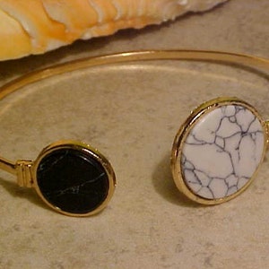 Y-337   Nice Gold Plated Open Cuff With One Round White Vain MARBLE Accent and One Black Vain MARBLE Accent BRACELET