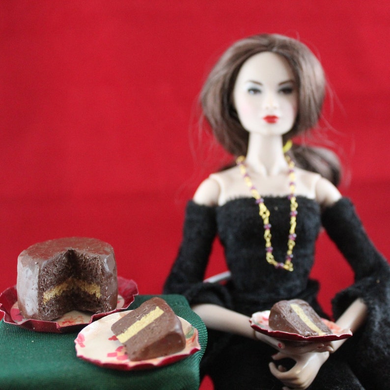 Realistic looking Chocolate Fudge Cake with 2 pieces sliced 1:6 Realistic looking Chocolate Fudge Cake with 2 pieces sliced 1:6