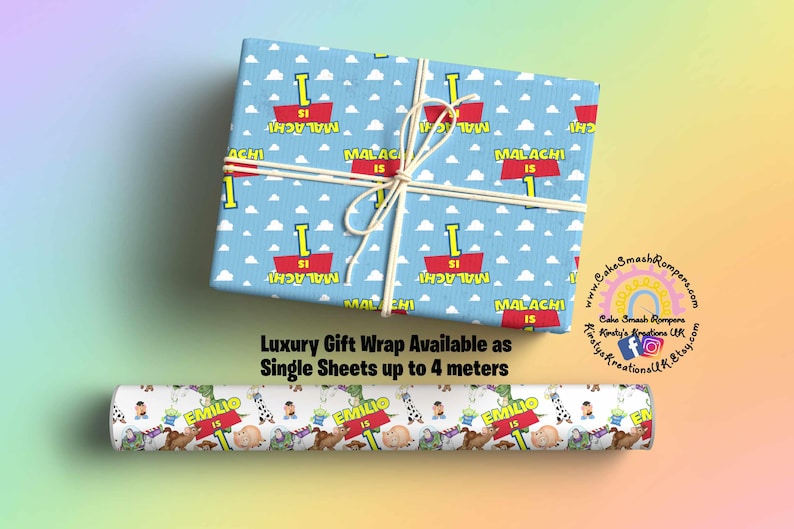 May include: Blue and white gift wrap with a repeating pattern of clouds and red signs that say "Malachi is 1". A roll of gift wrap with a white background and a repeating pattern of cartoon characters and the text "Emilio is 1" is also shown.