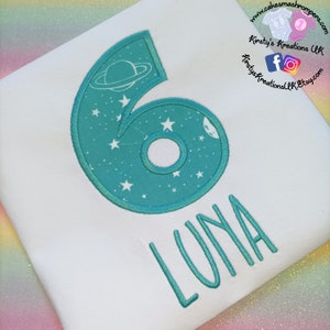 Space Themed Planets and Stars Birthday T-Shirt Embroidered Shirt with Birthday Number or Initial Personalised Birthday Shirt Smash UK prop