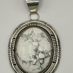 Vintage Large Navajo Silver and White Buffalo Pendant. Signed "F"
