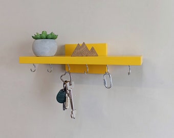 Handcrafted wooden wall shelf with hooks for keys, Minimalist Japanese style