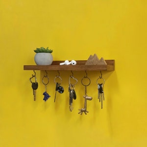 Minimalist hand made wooden wall shelf