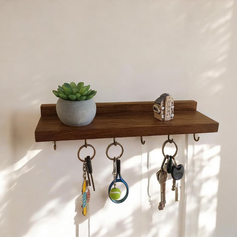 Wall shelf with hooksfor keys and keychains