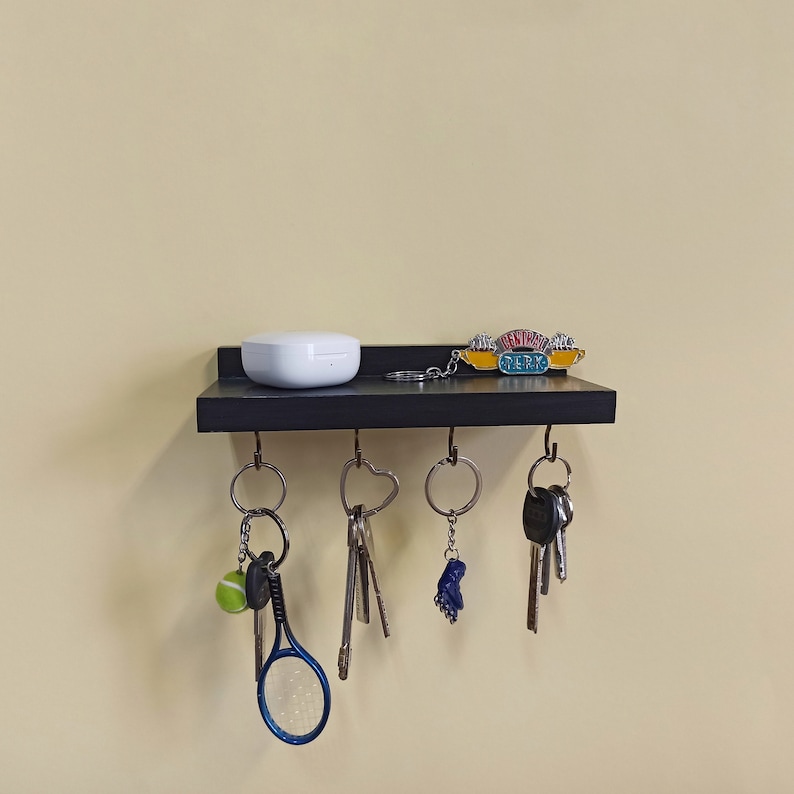 Wooden wall shelf key holder