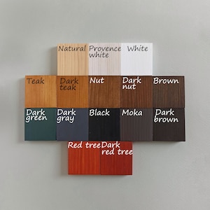 May include: Color chart showing 14 different wood stain colors. The colors are: Natural, Provence White, White, Teak, Dark Teak, Nut, Dark Nut, Brown, Dark Green, Dark Gray, Black, Moka, Dark Brown, Red Tree, Dark Red Tree.