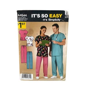 May include: A Simplicity sewing pattern for scrubs. The pattern includes illustrations of scrub tops and pants in pink and blue. The cover features a woman and a man wearing scrubs. The text on the cover reads "IT'S SO EASY" and "IT'S Simplicity".