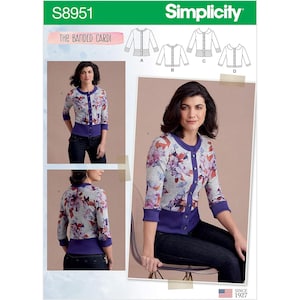 May include: Simplicity pattern S8951 for The Banded Cardi. The pattern features a woman wearing a floral print cardigan with a purple trim and button closure. The cardigan has three-quarter sleeves and is paired with dark blue jeans.