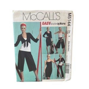 May include: A McCall's M5144 sewing pattern envelope for Easy Endless Options clothing. The front features illustrations of various outfits including a black bolero, white tank top, and black cropped pants, along with a barcode and size Y label.