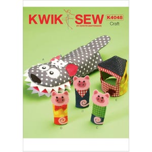 May include: Kwik Sew K4048 craft pattern featuring a gray and white polka-dotted shark, a house, and three pig finger puppets. The puppets have pink faces and are wearing different outfits. The pattern is by Kerstin Martensson.