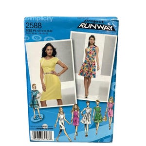 May include: Simplicity 2588 sewing pattern featuring dress designs. The package includes images of finished dresses in yellow and floral prints. The pattern size is P5, with measurements in inches, and includes the Project Runway logo.