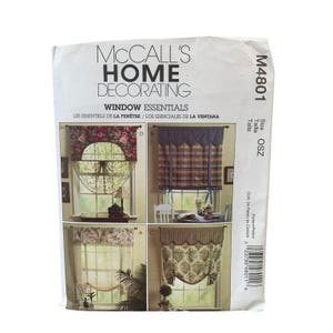 May include: A McCall's Home Decorating sewing pattern envelope labelled M4801 Window Essentials. The front displays four different window treatment designs, including floral, plaid, and damask patterns, with text indicating size OSZ and a barcode.