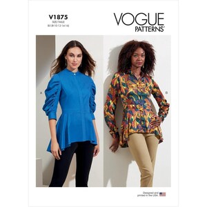 May include: Vogue Patterns V1875 sewing pattern envelope featuring two blouse variations. View A is a solid blue long-sleeve blouse with puffed shoulders and a peplum hem. View B is a multi-colored leaf-print blouse with long sleeves and a peplum hem.