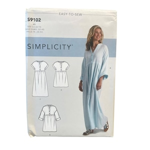 以下が含まれることがあります： Simplicityの型紙封筒、モデルS9102。ライトブルーのドレスの簡単に縫えるデザインが特徴です。パッケージには、ショート丈とロング丈を含む4種類のドレスのテクニカルな線画と、ライトブルーの生地で仕上げられた完成品の写真が掲載されています。