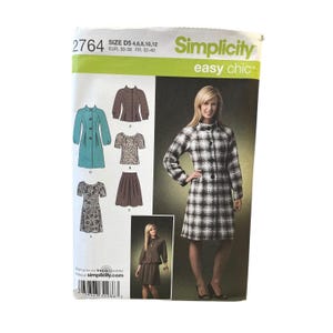 May include: Simplicity Easy Chic sewing pattern, size D5, featuring a woman in a black and white plaid coat and dress. The pattern includes designs for a coat, top, skirt, and dress. The pattern's size range is 4, 6, 8, 10, and 12.