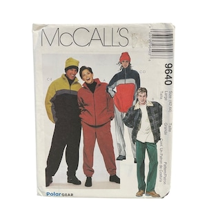 May include: A McCall's 9640 sewing pattern envelope for Polar Gear clothing. The front displays illustrations of four individuals wearing fleece jackets, pants, and hats in various color combinations including red, black, yellow, and plaid patterns.