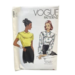 May include: Vogue Patterns V1809 sewing pattern envelope featuring illustrations of two blouses with collars and skirts. One blouse is solid yellow with short sleeves, the other is white with a blue and green floral print and long sleeves.