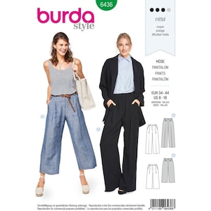Puede incluir: Un patrón de costura Burda Style, número 6436, con ilustraciones de pantalones de mujer. El patrón incluye varios estilos y tallas, con texto en inglés, alemán y español. El nivel de dificultad se indica como "mittel" o medio.