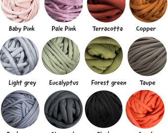 May include: Twelve balls of yarn in various colors, including baby pink, pale pink, terracotta, copper, light grey, eucalyptus, forest green, taupe, dark grey, charcoal, black, and coral.