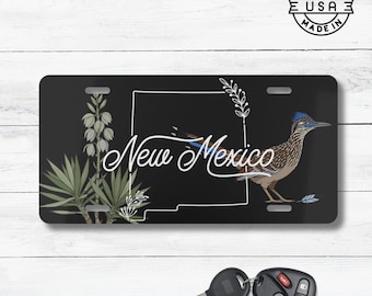 Placa de matrícula con el ave y la flor del estado de Nuevo México / Placa de matrícula con la yuca y el correcaminos