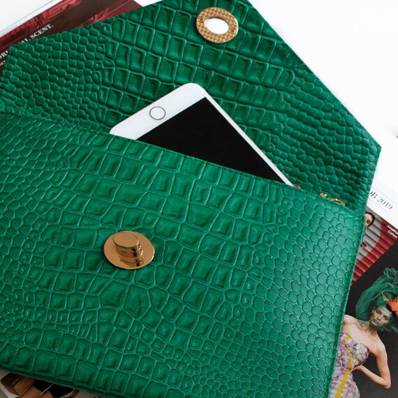 green clutch bag