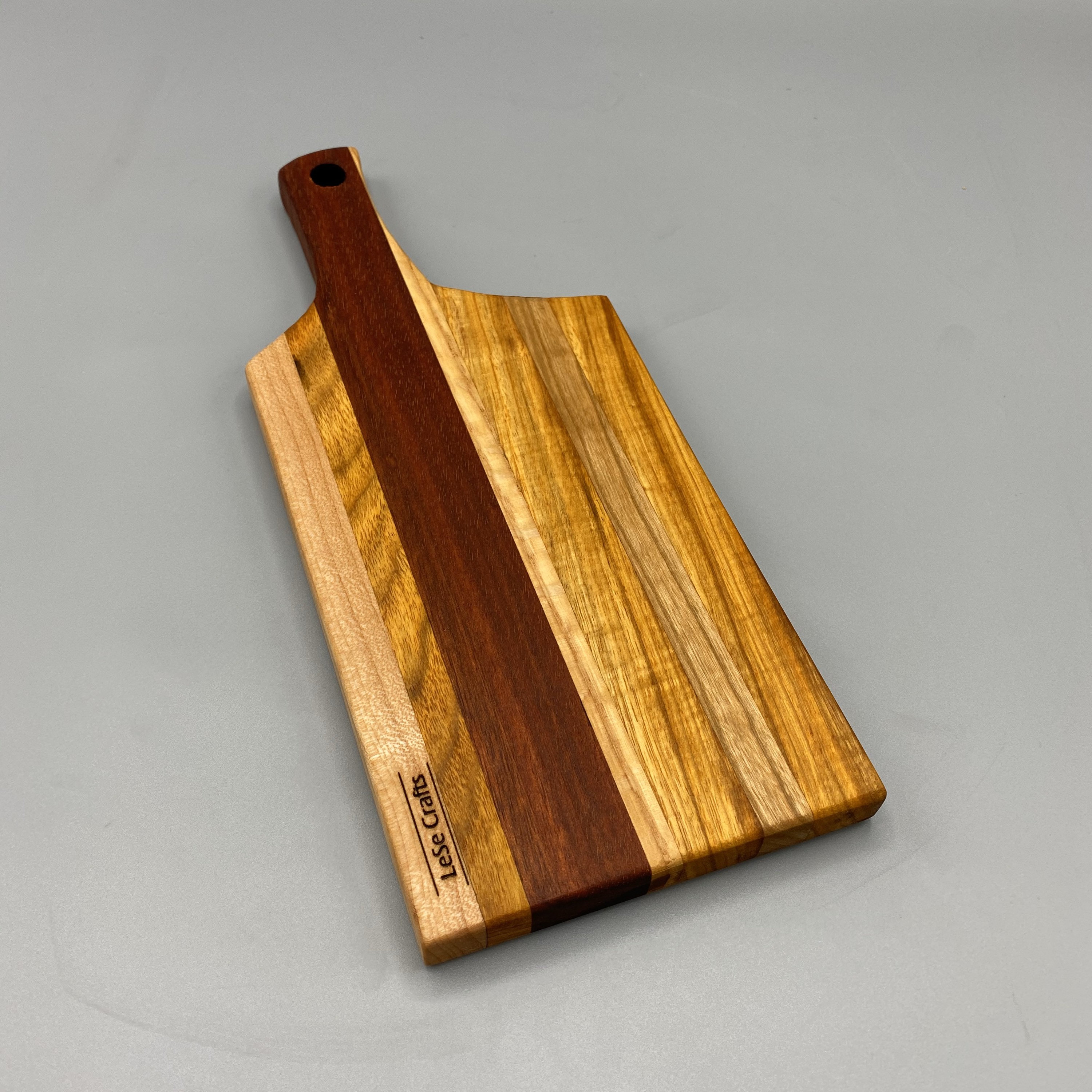 Wooden Cheese board with handle made from Exotic wood species, colorful