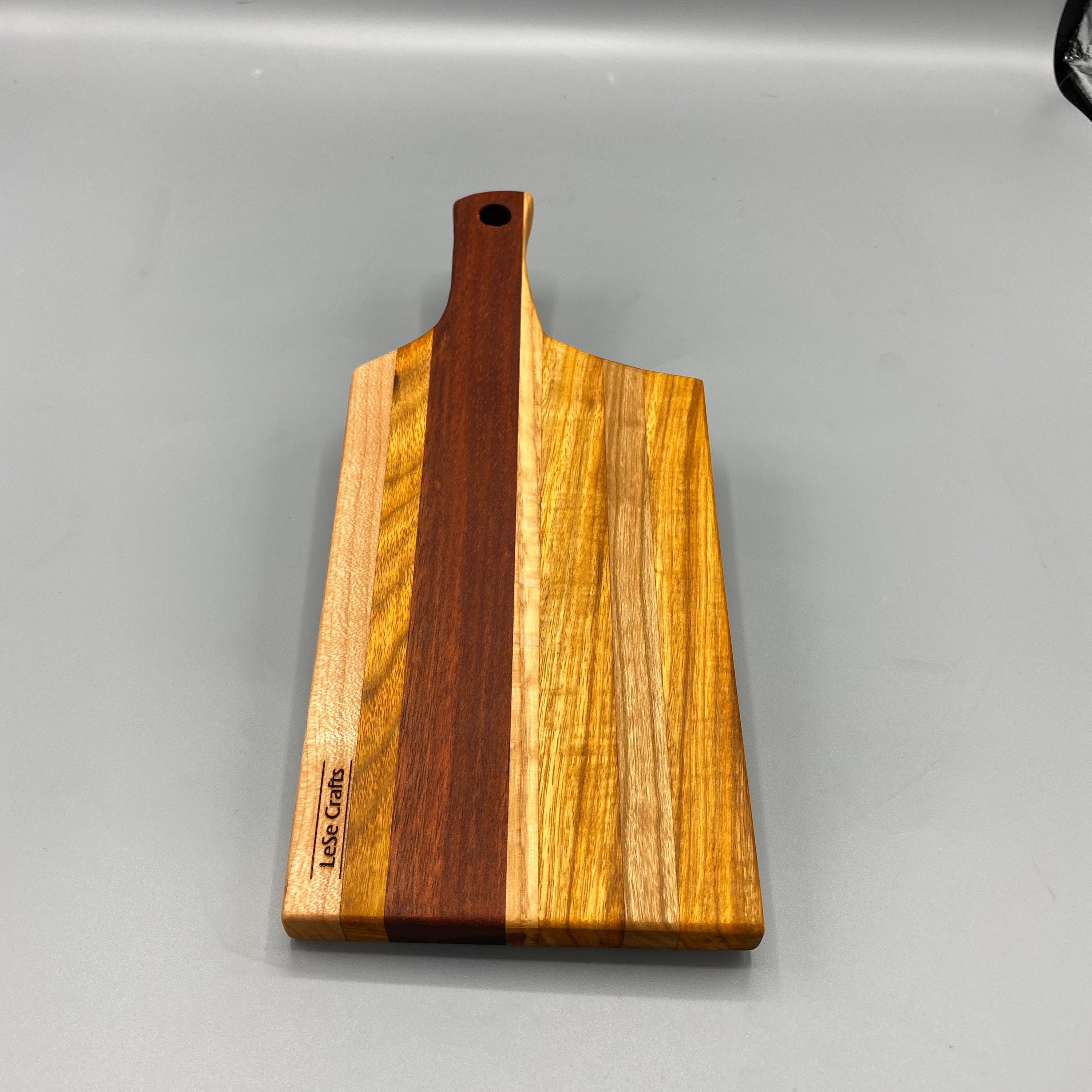 Wooden Cheese board with handle made from Exotic wood species, colorful
