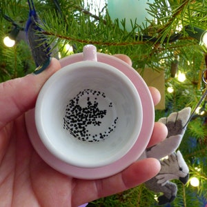 ominous teacup and saucer ornament image 2