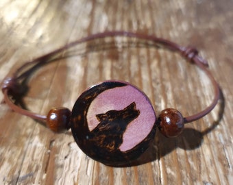 Wood Burned Wolf, Howling into a Crescent Moon Adjustable , customized Bracelet. Great Gift for Wolf Lovers. The back can be personalized.