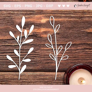 May include: Two white outline drawings of stylized branches with leaves on a brown wooden background. The branches are simple and elegant, with a minimalist design.