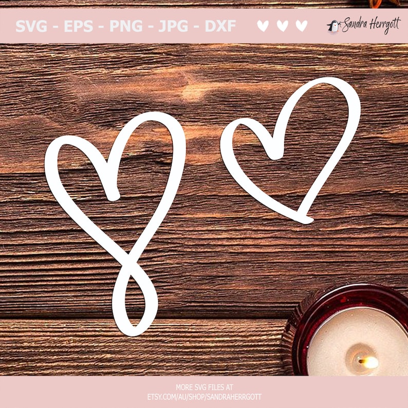 May include: Two white hand-drawn hearts on a brown wooden background. The hearts are simple and slightly imperfect, giving them a rustic charm.